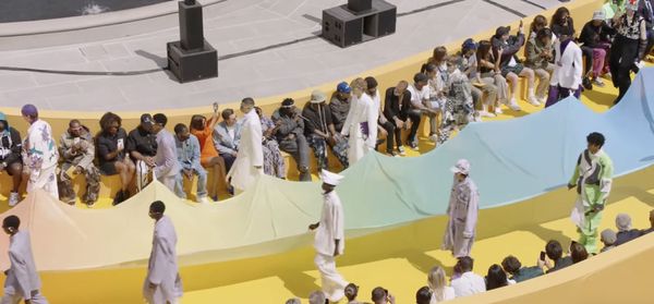 Kendrick Lamar in a crown of thorns at Louis Vuitton fashion show in Paris.